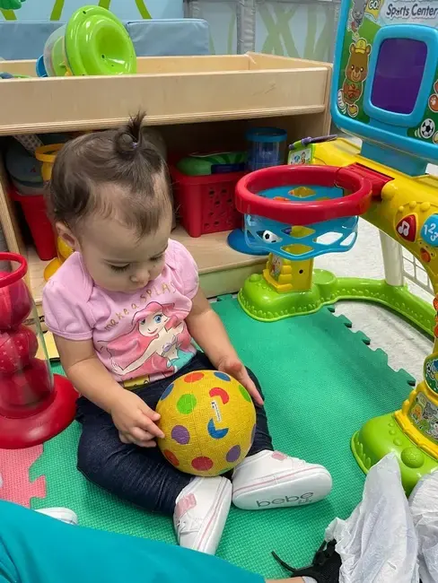 Baby playing with a ball